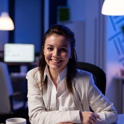 close up portrait of business woman smiling at camera